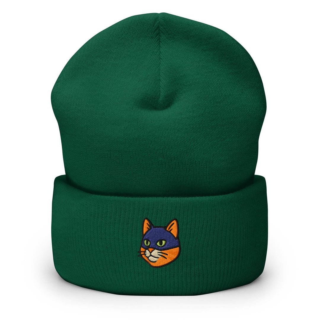 a green beanie with a cartoon cat on it