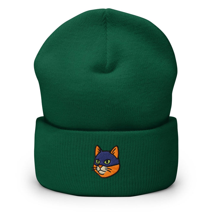 a green beanie with a cartoon cat on it