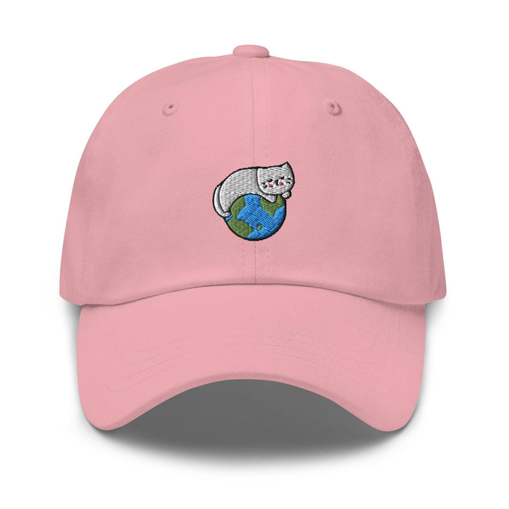 a pink hat with a cat on top of it