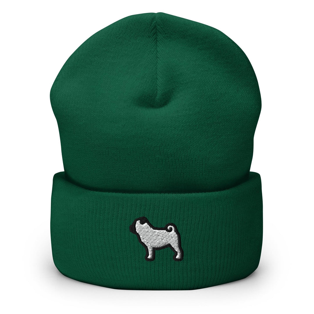 a green beanie with a white dog on it