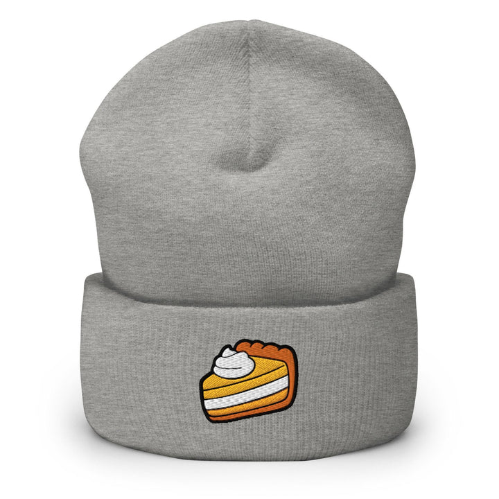 a grey beanie with a piece of cake on it