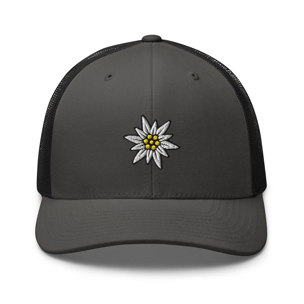 a gray and black trucker hat with a daisy on the front