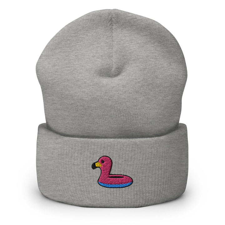 a grey beanie with a pink ducky on it