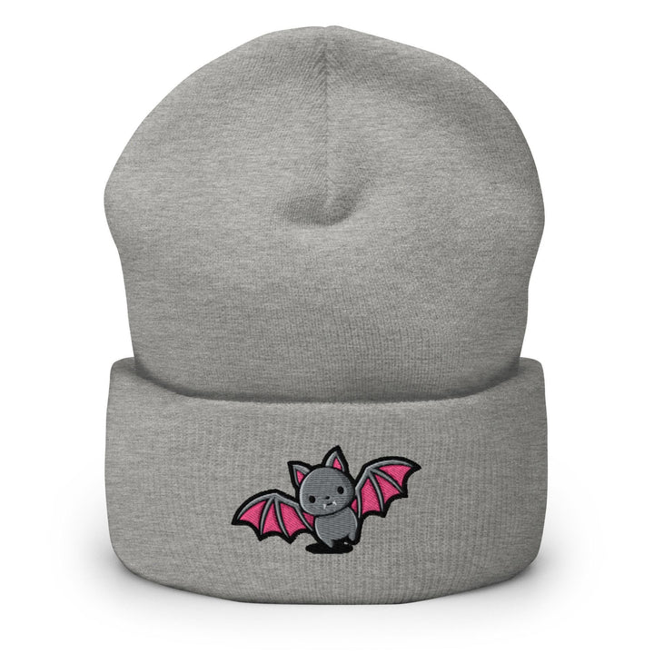 a grey beanie with a pink bat on it