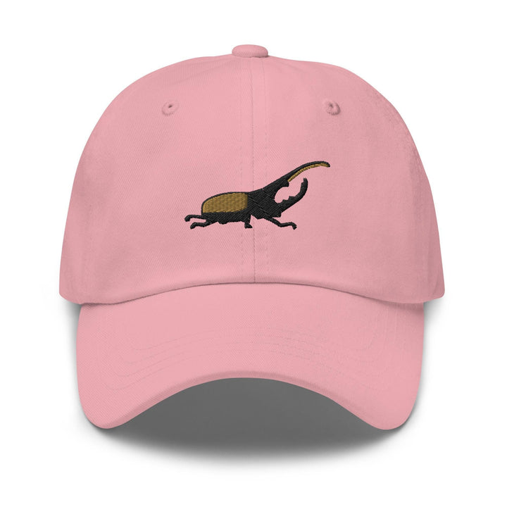 a pink hat with an image of a lizard on it