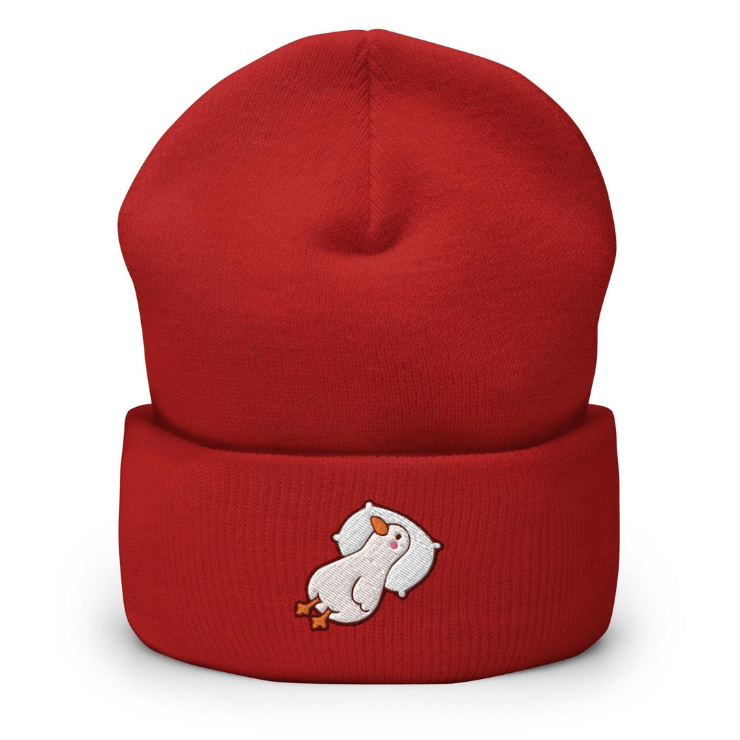 a red beanie with a polar bear on it