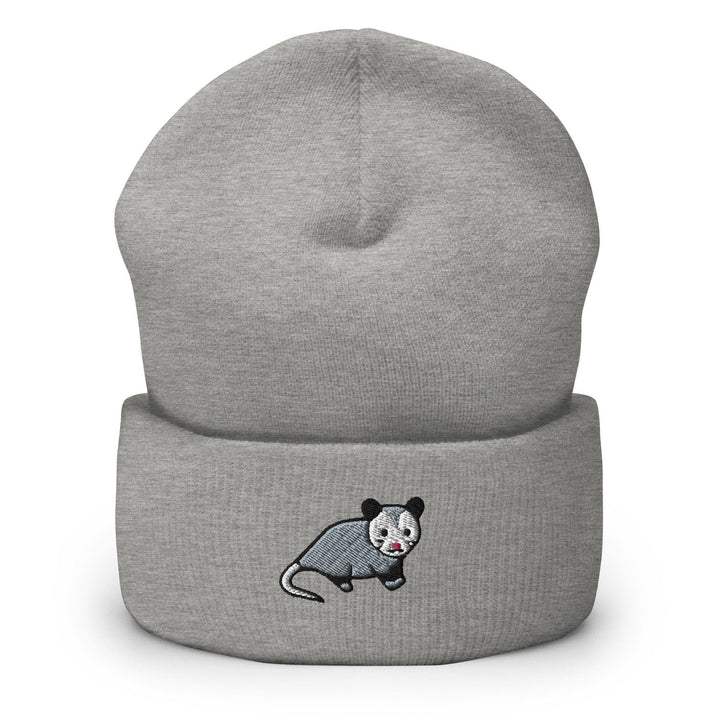 a gray beanie with a black and white panda on it