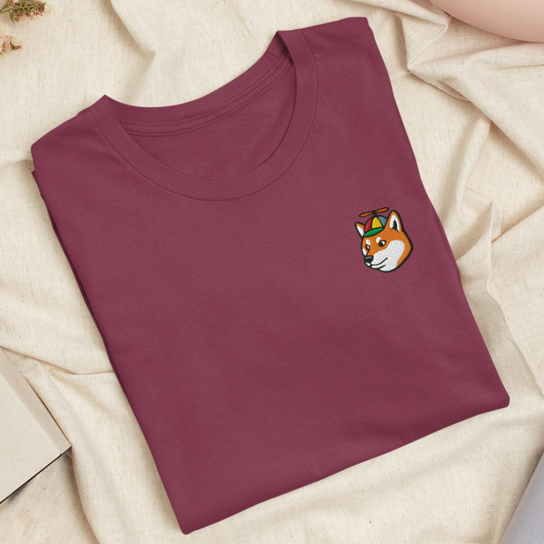 a t - shirt with a fox embroidered on it