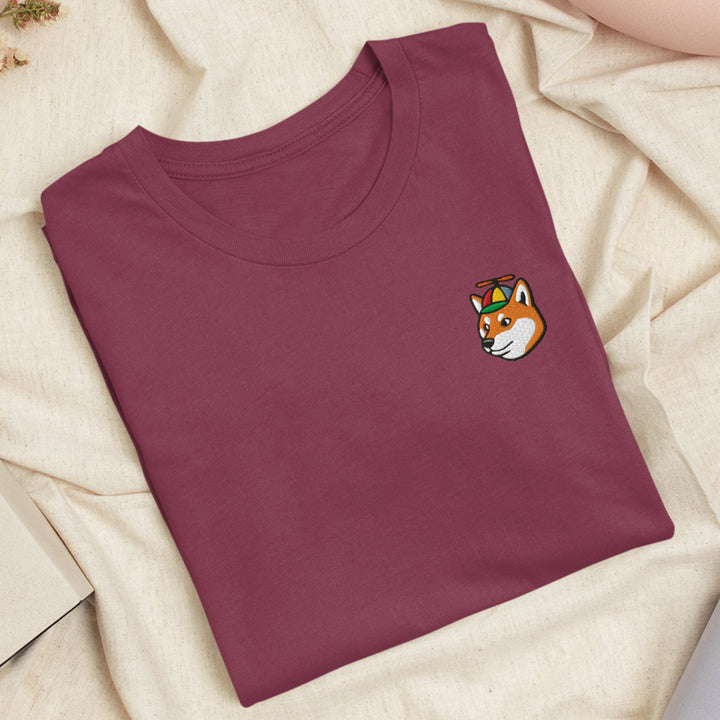 a t - shirt with a fox embroidered on it