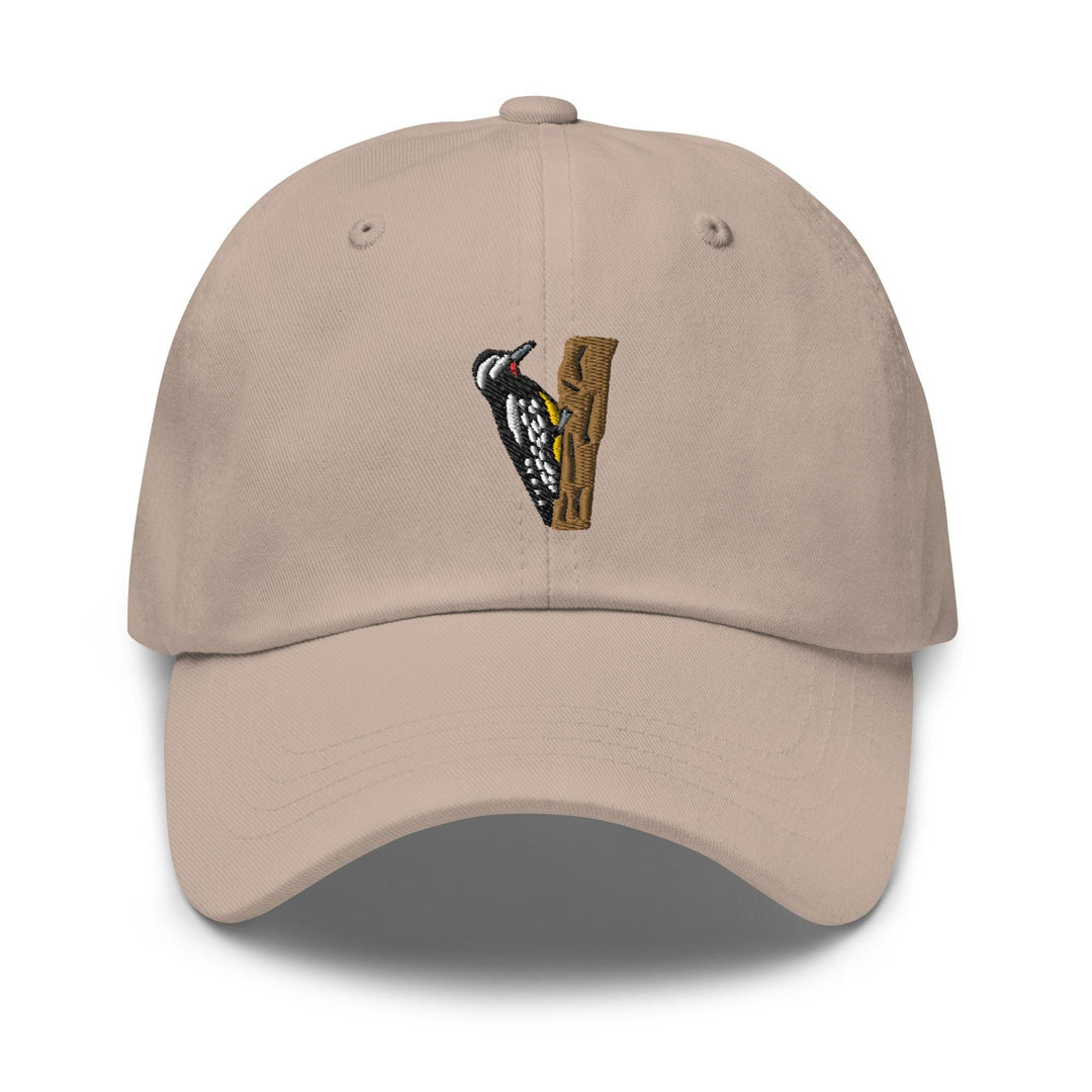 a baseball cap with a bird on it