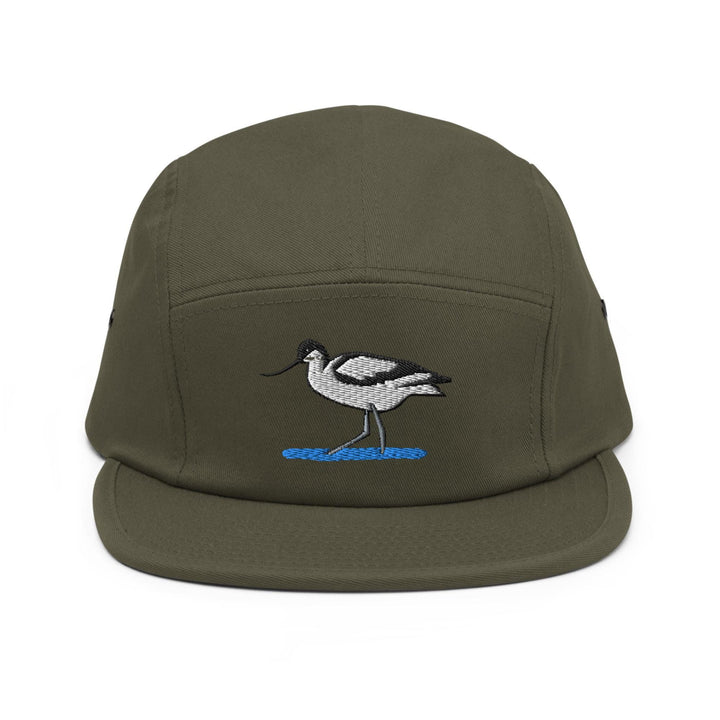 a green hat with a bird embroidered on it