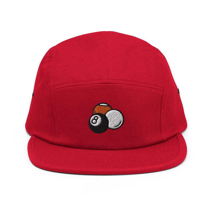 a red hat with a pool ball embroidered on it