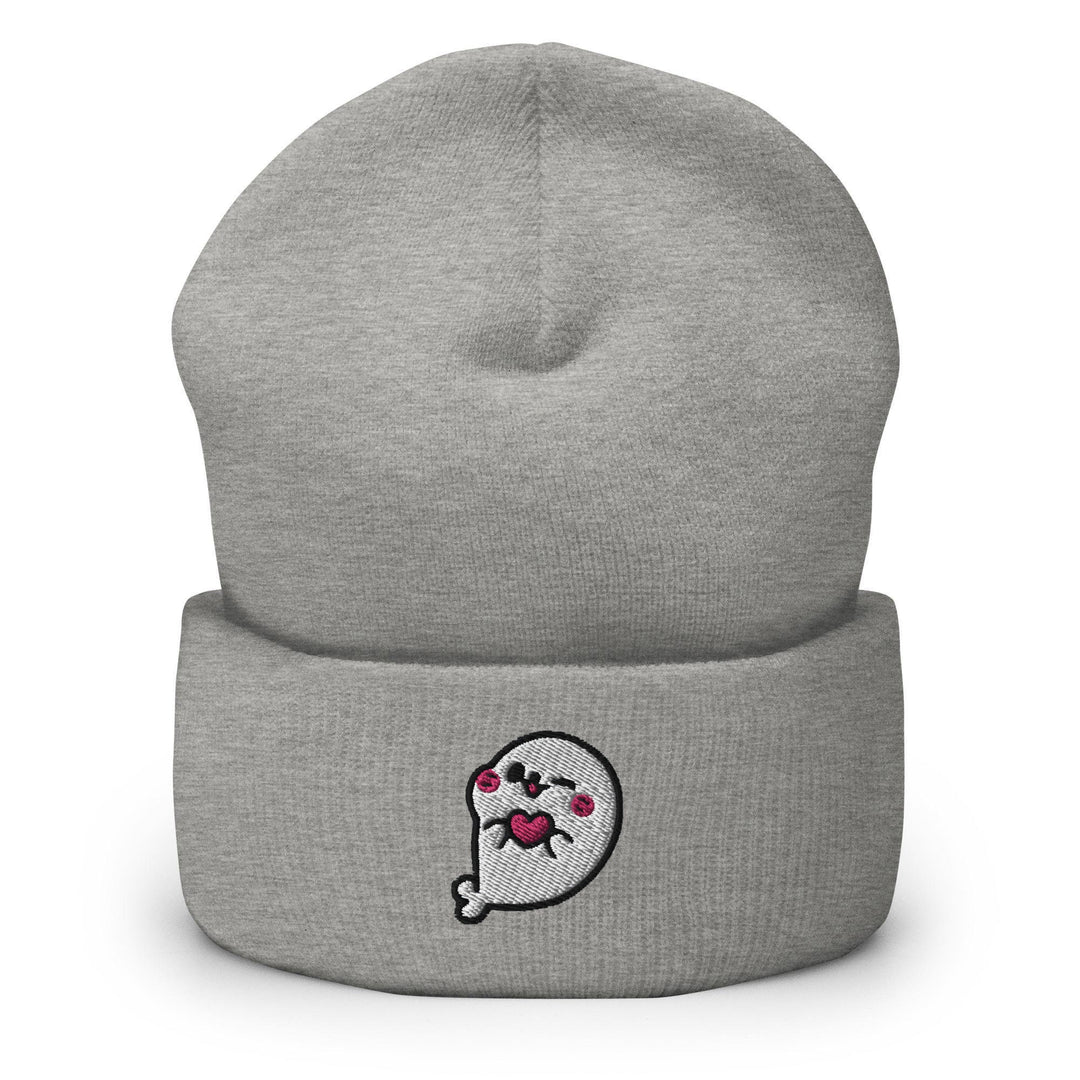 a grey beanie with a skull on it