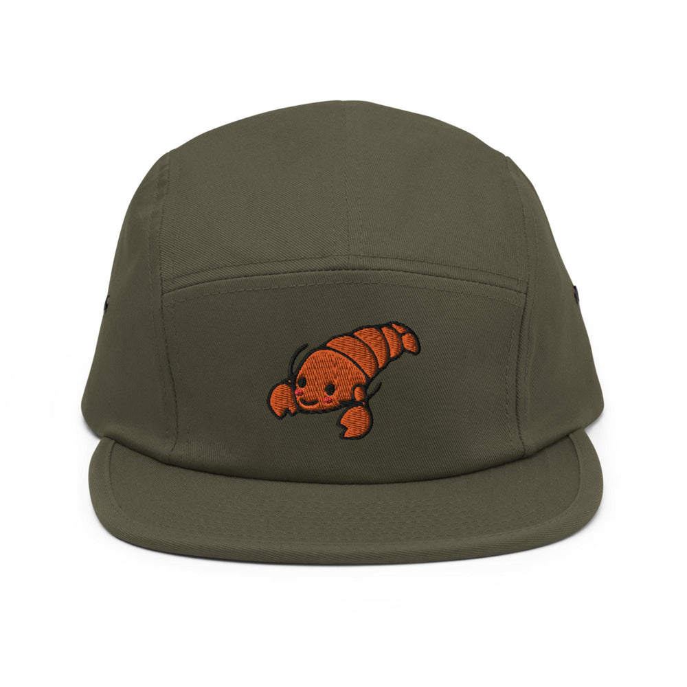 a green hat with an orange fish embroidered on it