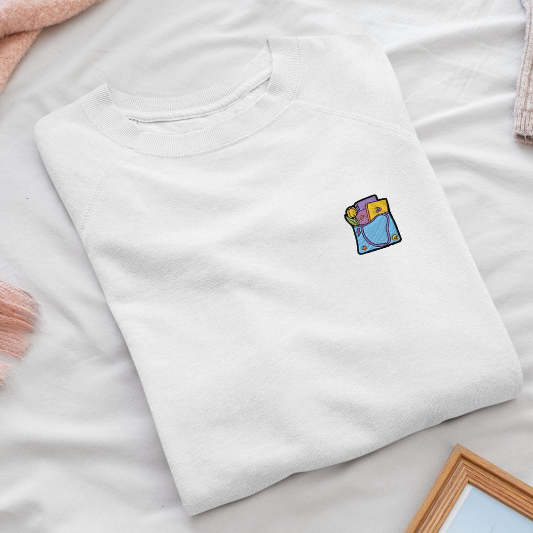 a white t - shirt with a picture of a person on it