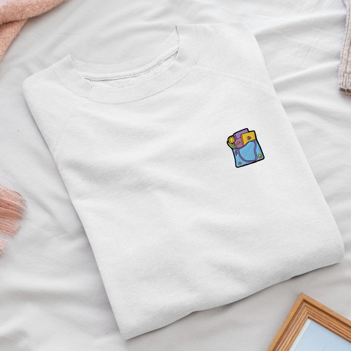 a white t - shirt with a picture of a person on it