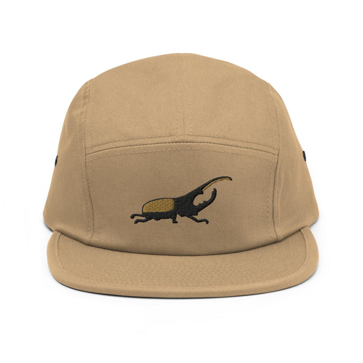 a brown hat with a lizard embroidered on it