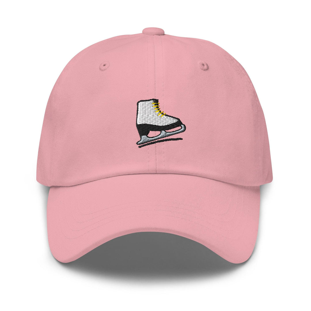 a pink hat with a pair of ice skates embroidered on it