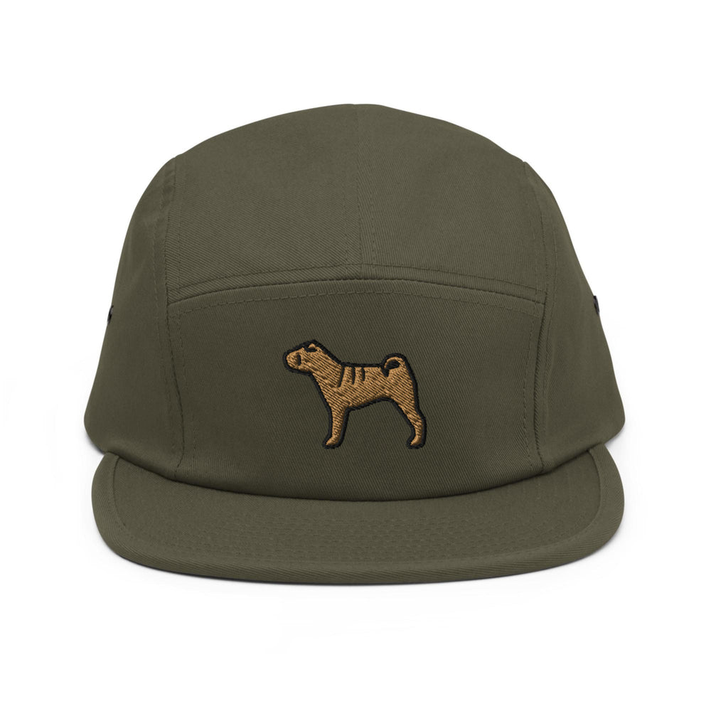 a green hat with a brown dog embroidered on it