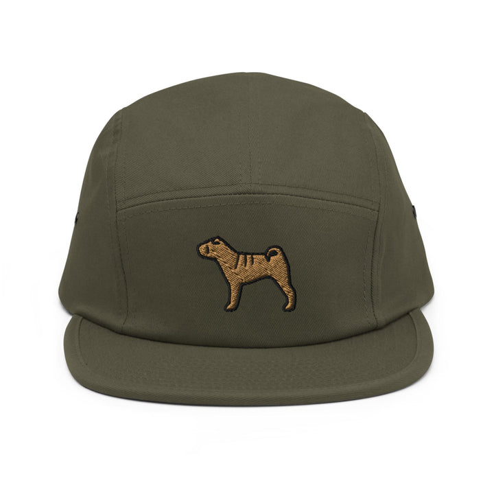 a green hat with a brown dog embroidered on it