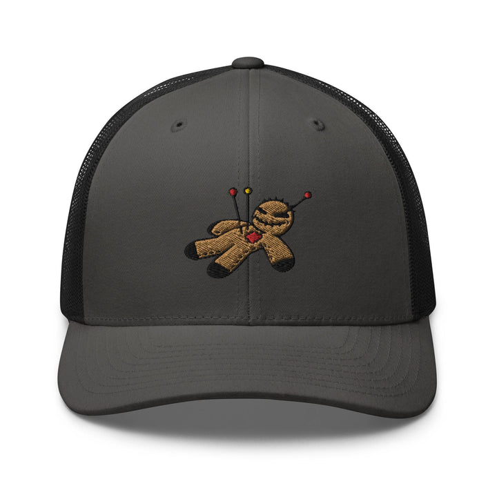 a gray and black trucker hat with a teddy bear embroidered on the front