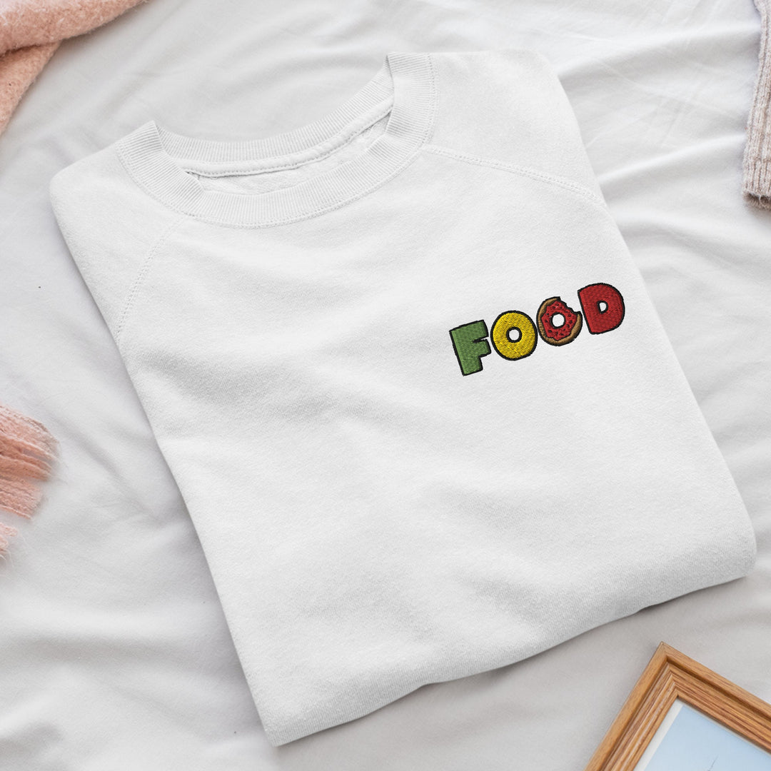 a white shirt with the word food on it