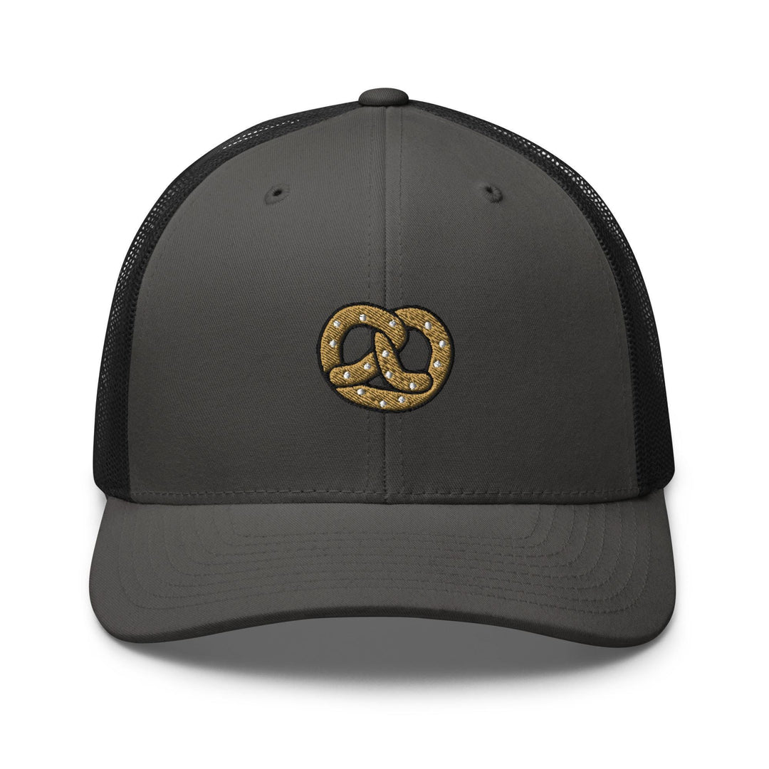 a gray and black hat with a gold knot on the front