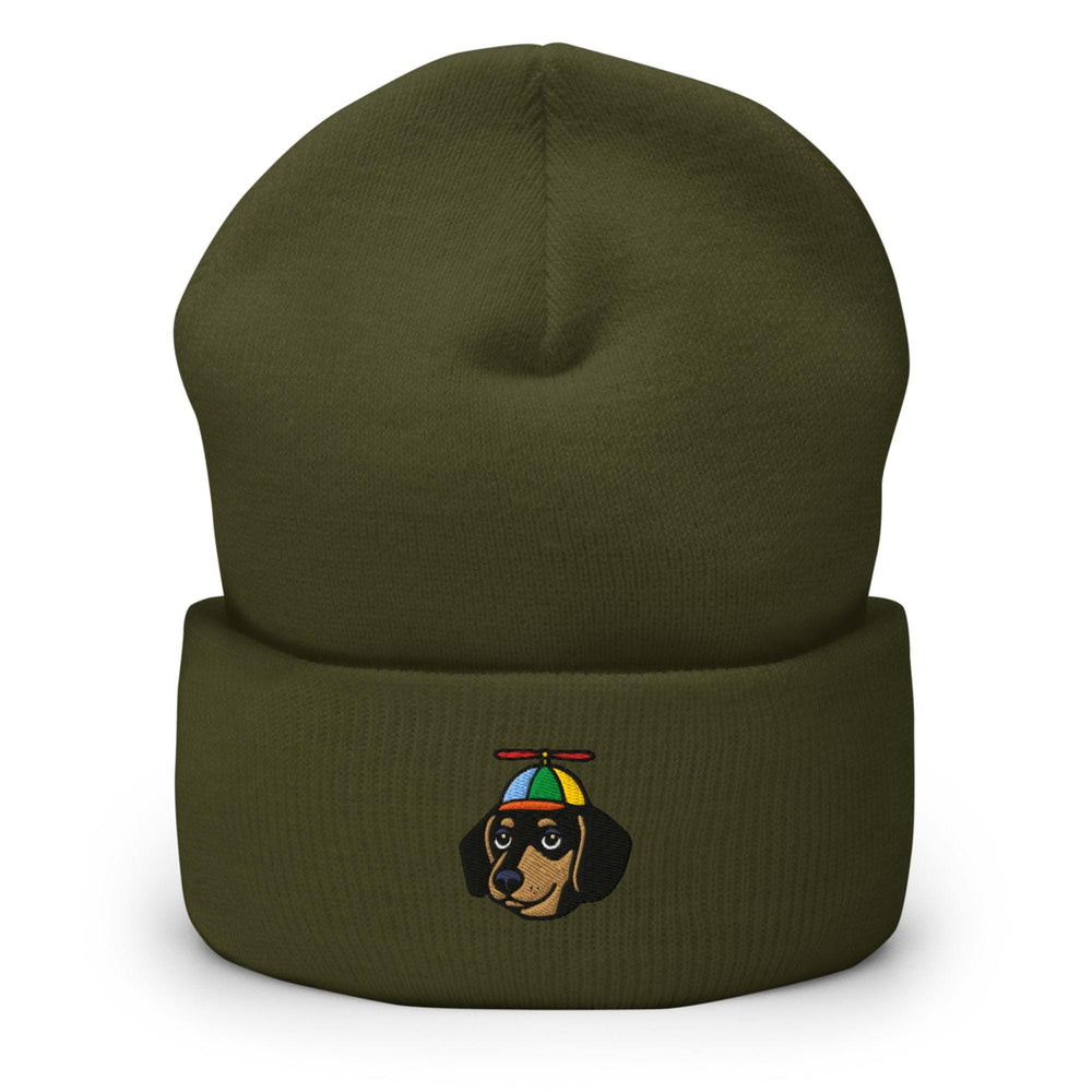 a green beanie with a picture of a dog wearing a hat