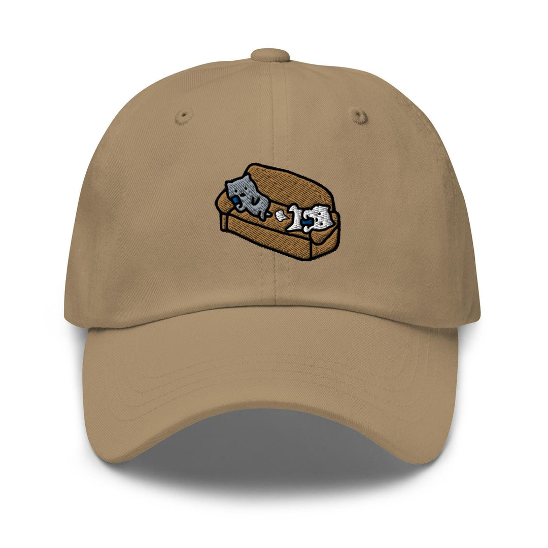 a tan hat with two cats on a piece of bread
