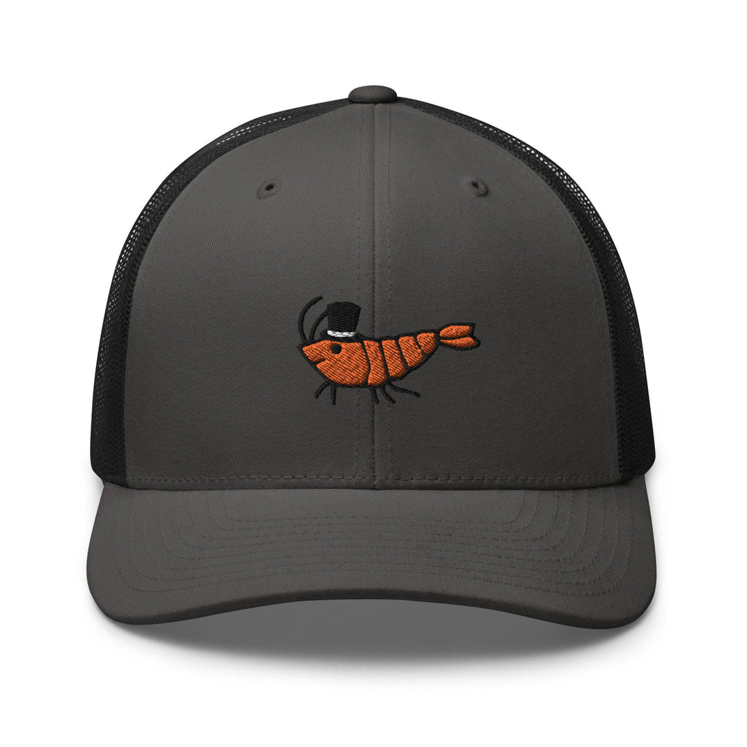 a gray and black trucker hat with a picture of a shrimp on it