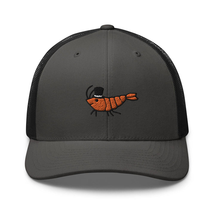 a gray and black trucker hat with a picture of a shrimp on it