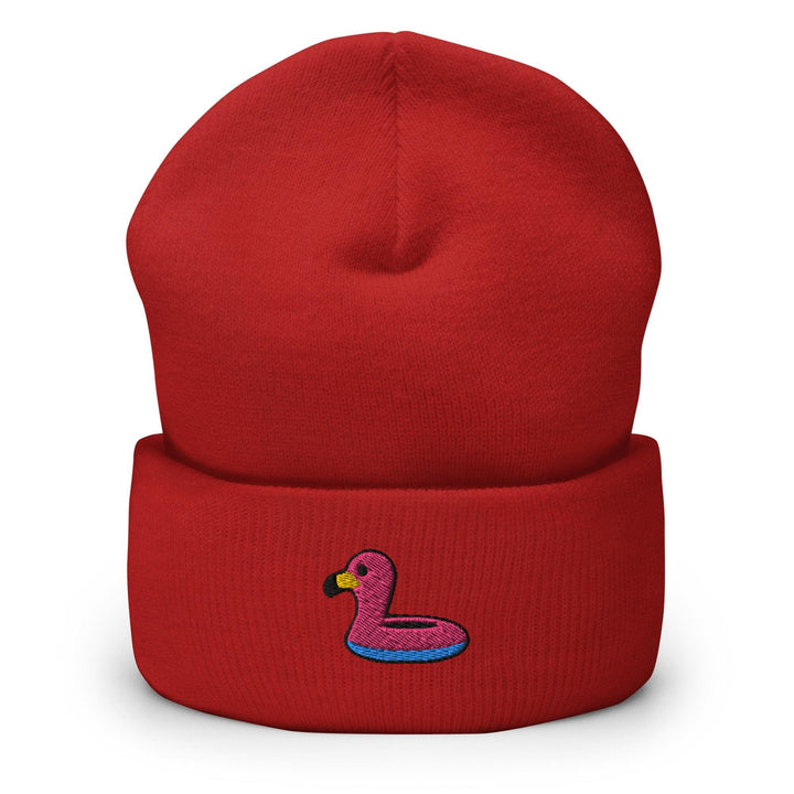 a red beanie with a pink duck on it