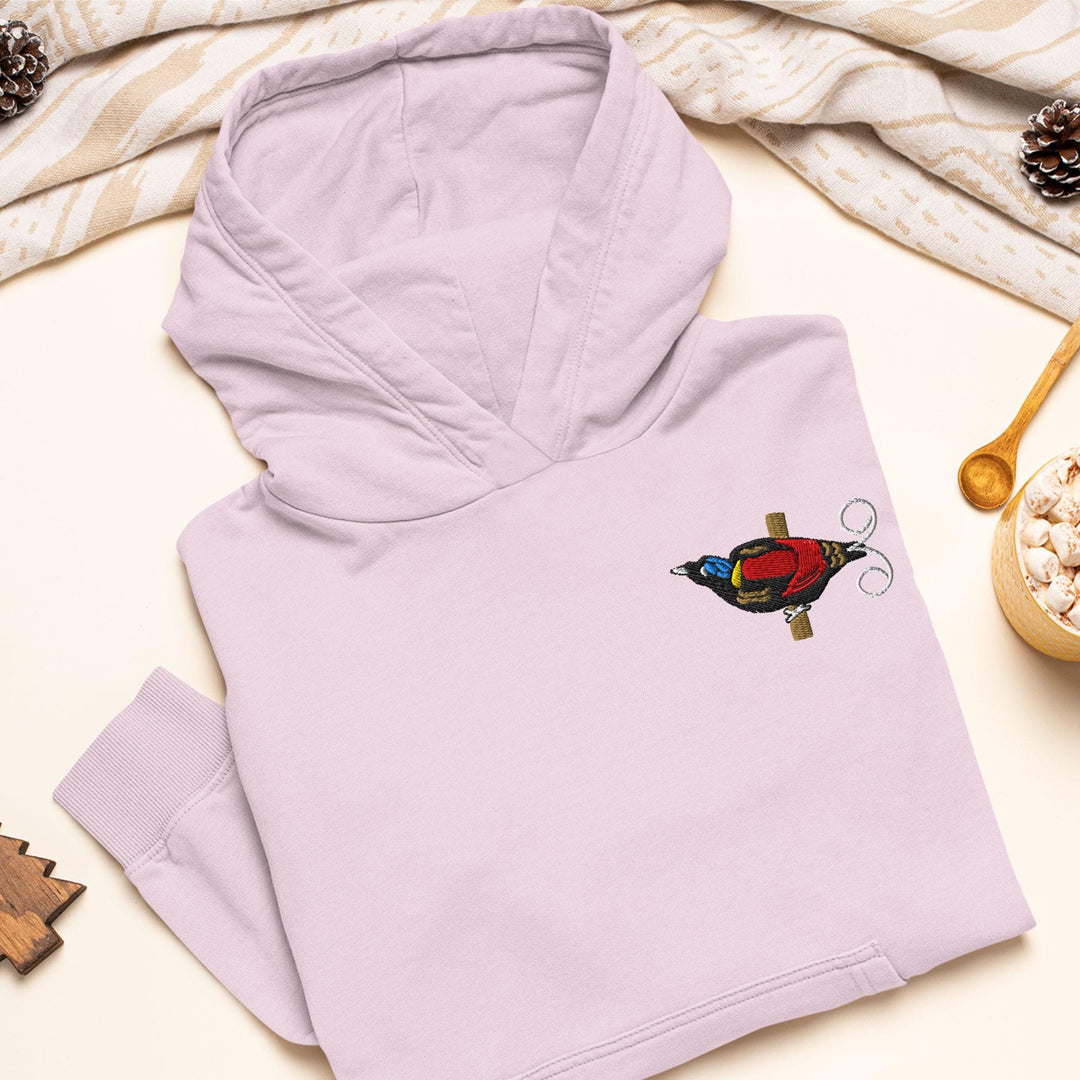 a pink hoodie with a bird embroidered on it