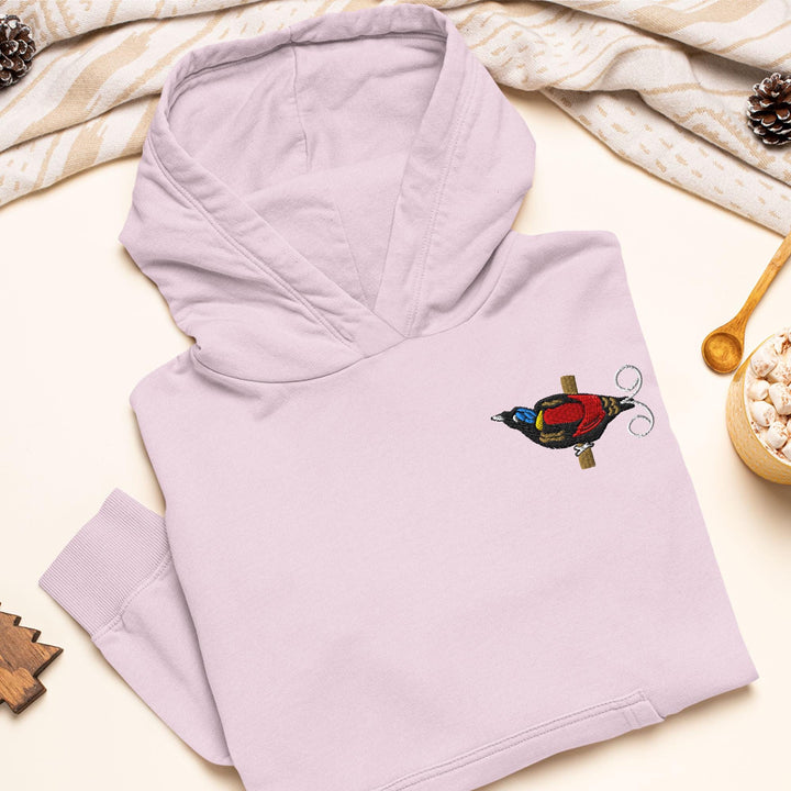 a pink hoodie with a bird embroidered on it