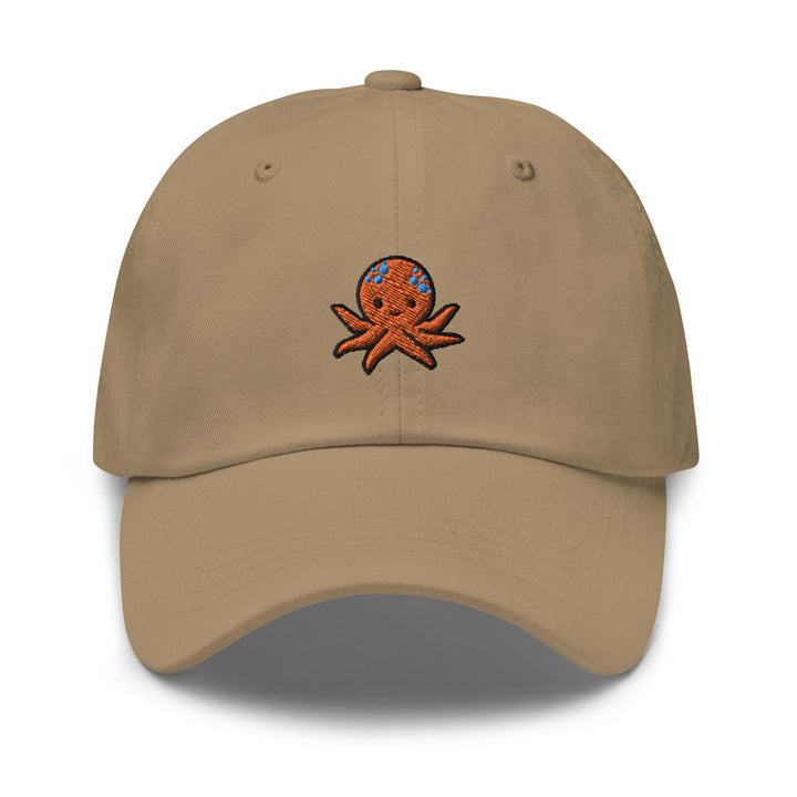a tan hat with an octopus embroidered on it
