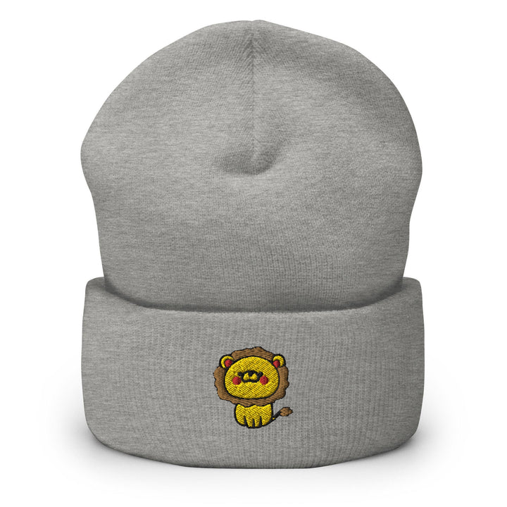 a grey beanie with a yellow lion on it
