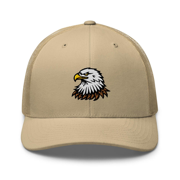 a tan trucker hat with an eagle on the front