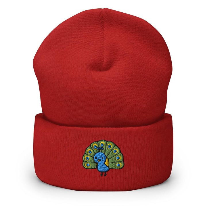 a red beanie with a colorful peacock on it