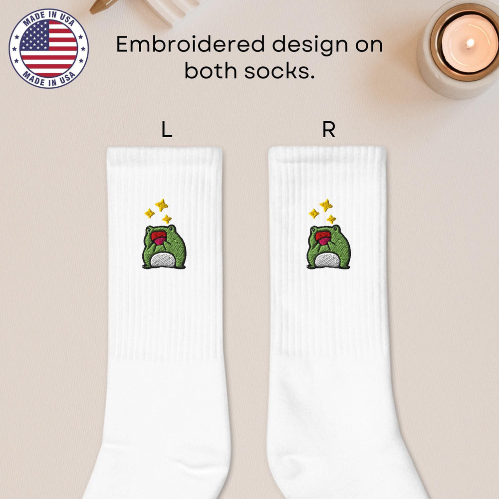 a pair of white socks with a cartoon character on them