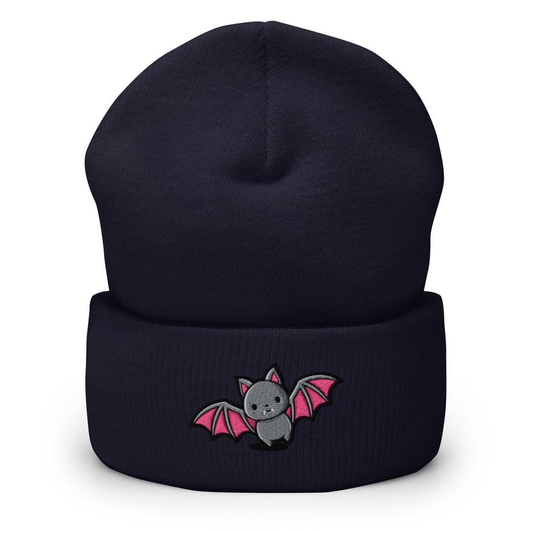 a black beanie with a pink bat on it