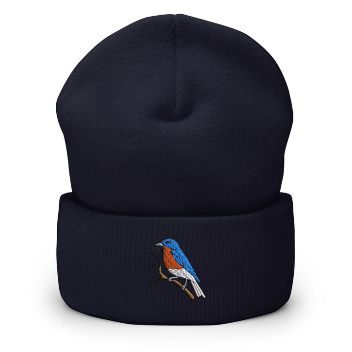 a blue hat with a colorful bird on it