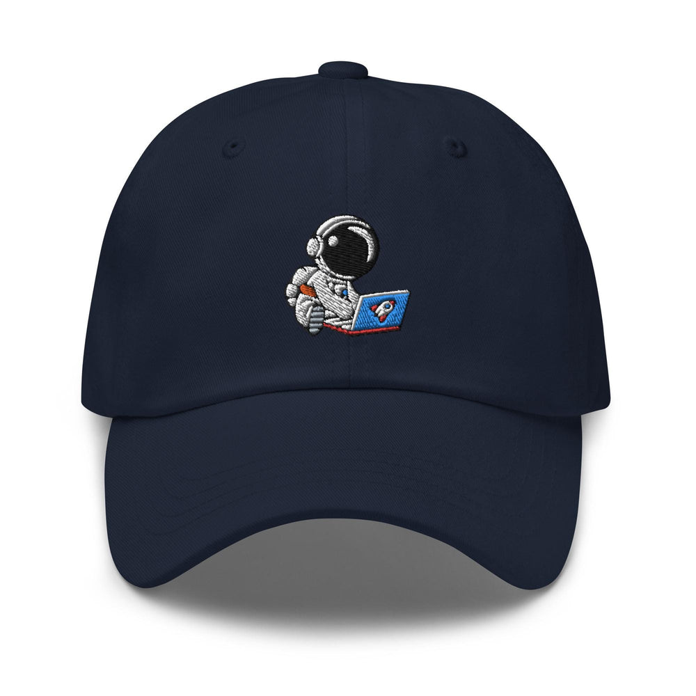 a hat with an astronaut reading a book