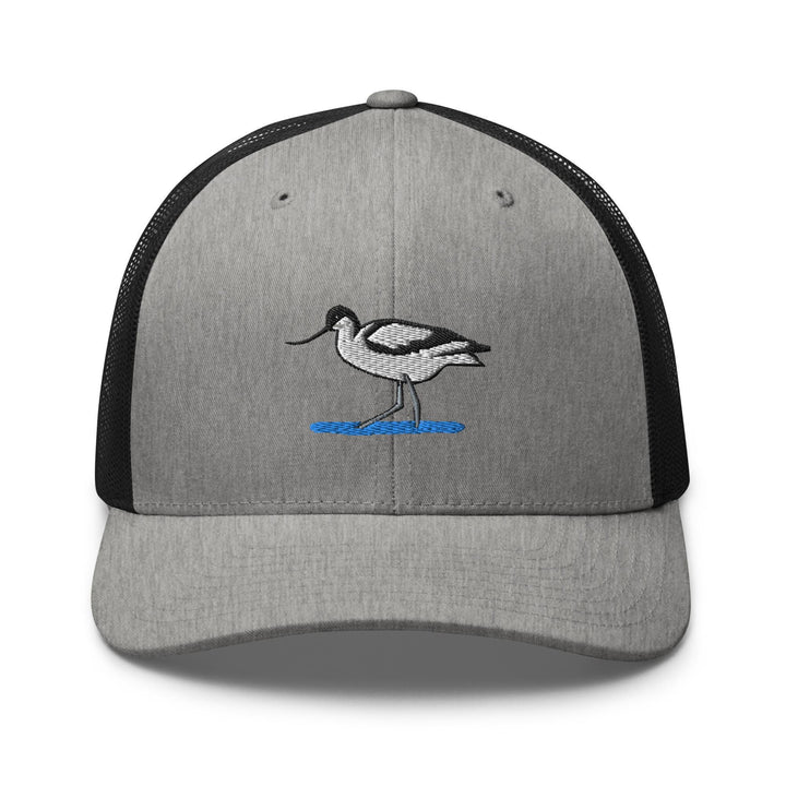 a grey and black hat with a bird on it