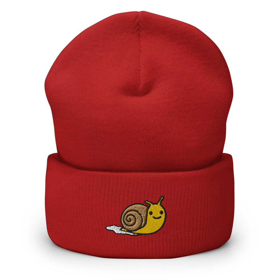 a red beanie with a snail on it