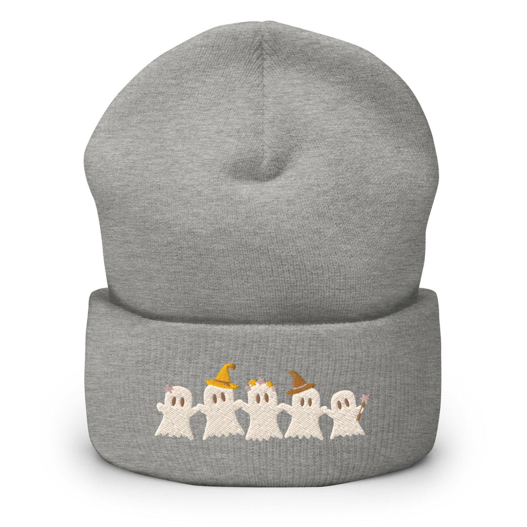 a gray beanie with three ghost on it