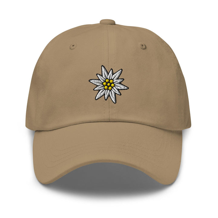 a tan hat with a daisy embroidered on the front