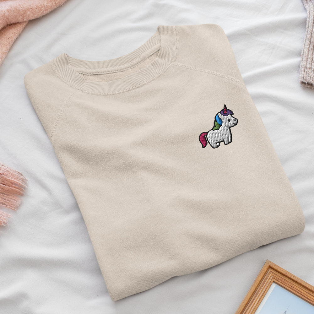 a t - shirt with a unicorn embroidered on it