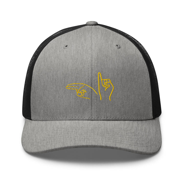 a gray and black trucker hat with a yellow logo