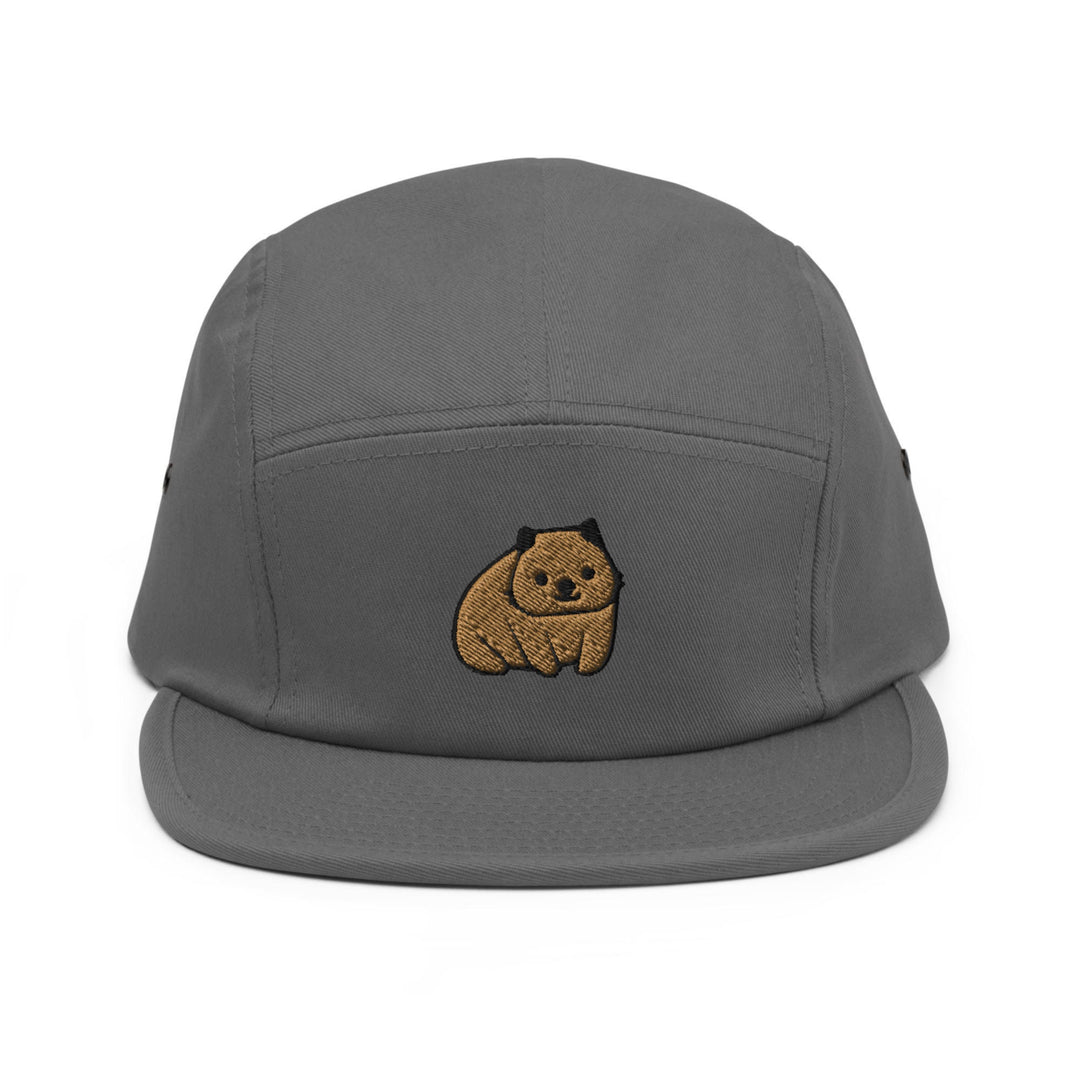 a grey hat with a brown bear embroidered on it