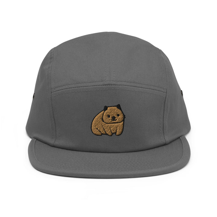 a grey hat with a brown bear embroidered on it